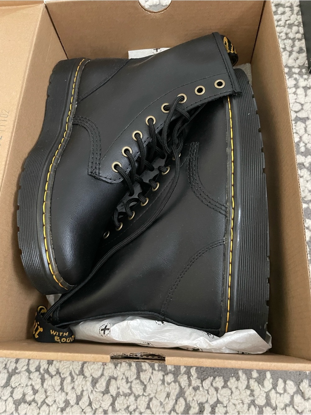 Dr. Martens Black Leather Boots with Yellow Stitching